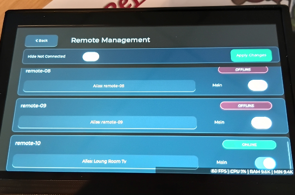 Remote Management on the physical ESP32-P4 controller showing online and offline remotes, Friendly Aliases, Main selection and Hide Not Connected